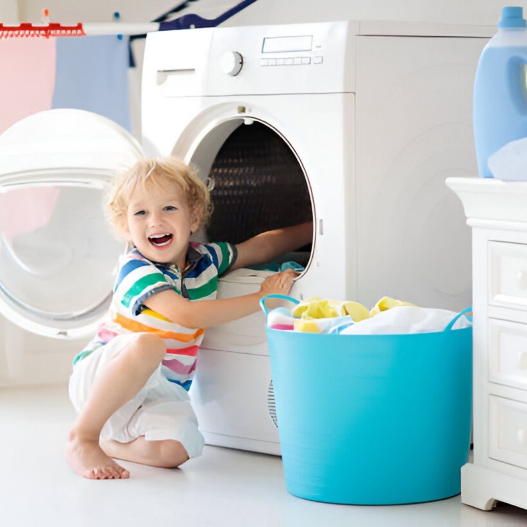 Happy Boy With Arm In Washing Machine - SoftPro Water Filters and Purification