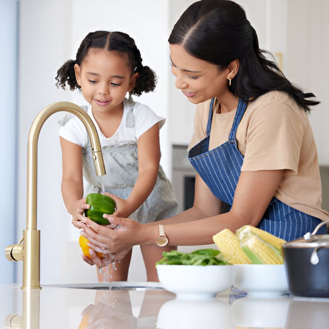 Mom With Young Girl Washing Bell Peppers In Kitchen Sink A971c979 Deae 48dc 98a9 95403425e48c - SoftPro Water Filters and Purification